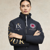 Woman wears the Holland Cooper Team HC Jacket in Navy